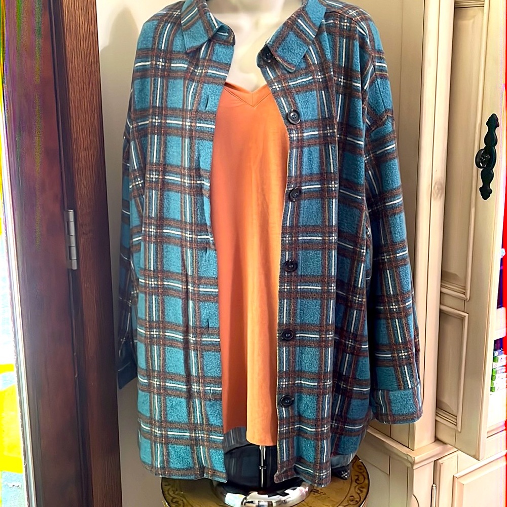 This Zenana long sleeve button down top is the definition of style and comfort!